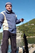Miesmuschelsack mit Emil Sosic am Limski Kanal, Kroatien / Zum Vergrößern auf das Bild klicken