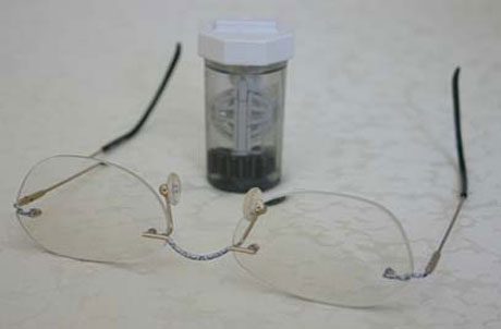 55PLUS Brille oder Kontaktlinse