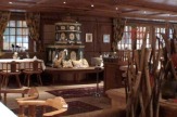 Alpine Luxury Hotel Post, Lermoos - Kaminrestaurant / Zum Vergrößern auf das Bild klicken