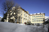© Ferienregion Engadin Scuol Samnaun / Hotel Schweizerhof, Engadin - Außenansicht im Winter