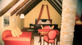55PLUS Medien / Hotel-Restaurant Brummeier Suite mit Bett / Zum Vergrößern auf das Bild klicken